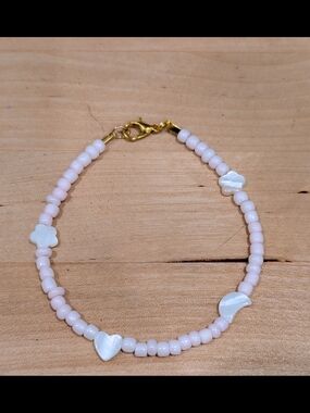 Delicate Pink Beaded Bracelet with Mother-of-Pearl Charms